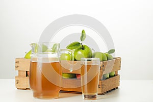 Fresh apple juice in white background. photo