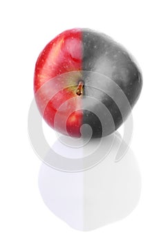 Fresh apple with red and colourless half photo