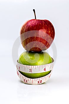 Fresh apple with tape on white background