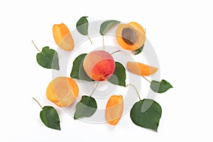 Fresh Apricot fruits isolated on bright background, sliced and whole.