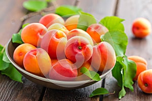 Fresh apricots with leaves