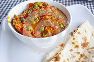 Fresh aromatic indian tradition food - vegetable curry with chapatti