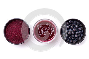 Fresh Aronia berries, powder and jam photo