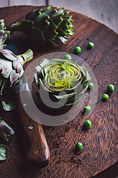 Fresh artichokes on a cutting board