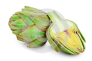 Fresh Artichokes and half isolated on white background closeup