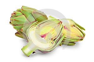 Fresh Artichokes and half isolated on white background closeup