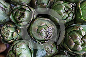 Fresh artichokes for sale at farmer`s market.