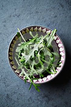 Fresh arugula in a bowl