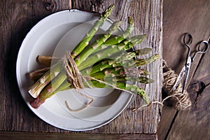 Fresh asparagus in a bowl