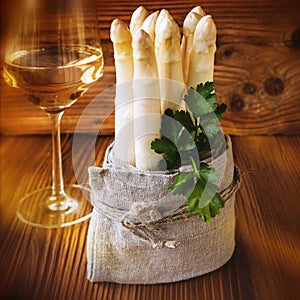 Fresh asparagus with a glas white wine