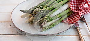 Fresh asparagus on a plate photo