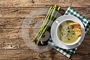 Fresh asparagus soup in bowl.Copy space
