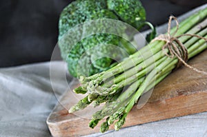 Fresh Asparagus on Wooden Cutting Board