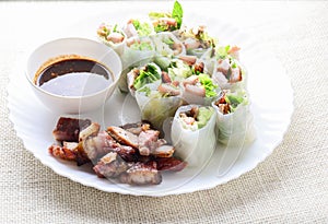 Fresh assorted Asian spring rolls with grilled pork, fresh vegetable.