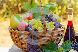 Fresh autumn fruits and red wine