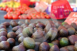 Fresh avocado at farmer market in France, Europe. Italian avocados. Street French market at Nice.