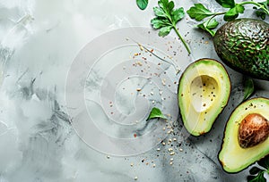 Fresh Avocado Halves With Seed and Parsley on a Gray Marble Background