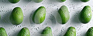 Fresh avocados with water droplets on white background