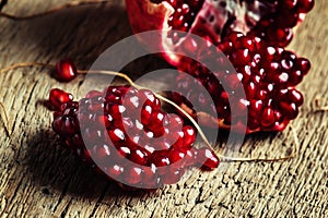 Fresh azerbaijan pomegranate, still life in rustic style, vintag