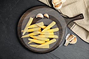Fresh baby corn cobs served on table, flat lay