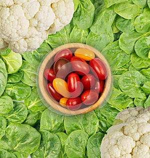 Fresh Baby Spinach Leaves and and cherry tomatoes