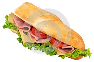 Fresh baguette sandwich with ham, cheese, tomatoes, and lettuce