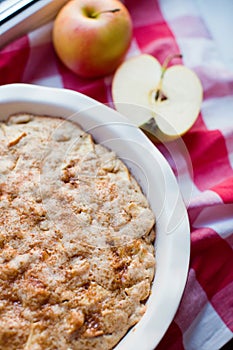 Fresh baked apple pie and apples