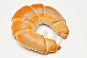 Fresh baked bagel isolated on white background