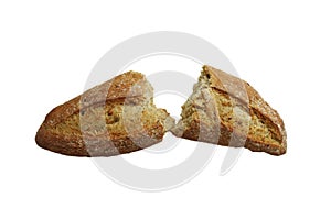 Fresh baked bread loaf broken in half isolated on white background, food concept, dry summer and hungry people