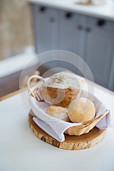 Fresh baked bread and loafs in a wicker basket