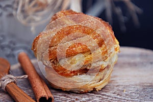 Fresh baked Bun with Cinnamon rol. Close up bakerry and Confectionarry Dessert. Rustic Background.
