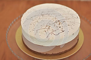 Fresh baked cappuccino cake on wood