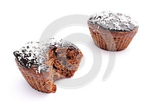 Fresh baked chocolate muffin with desiccated coconut