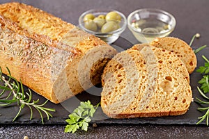 Fresh baked Ciabatta with carrot, herbs and spices