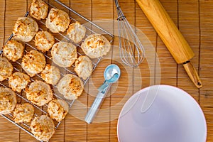 Fresh baked coconut macaroons with seasons greeting tag.