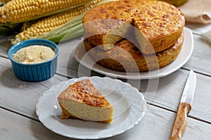 Fresh baked corn bread on wooden background