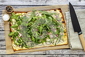 Fresh baked flammkuchen - Traditional German pizza or french tarte flambee in vegetarian recipe