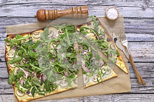 Fresh baked flammkuchen - Traditional German pizza or french tarte flambee in vegetarian recipe