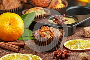 Fresh baked homemade citrus orange, Mandarin cakes muffins with brown sugar, cinnamon and star anise