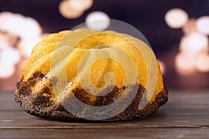Fresh baked marble gugelhupf sweet bread with lights