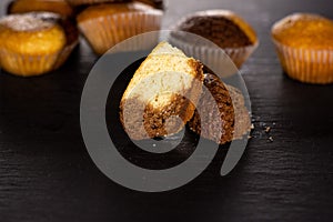 Fresh baked marble muffin on grey stone