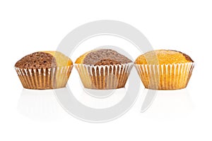 Fresh baked marble muffin isolated on white