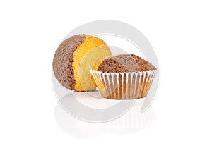 Fresh baked marble muffin isolated on white