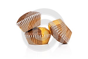 Fresh baked marble muffin isolated on white