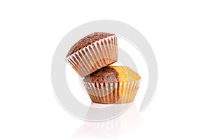 Fresh baked marble muffin isolated on white