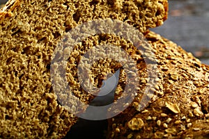 Fresh baked Multigrain brown bread loaf close up. - healthy  eating concepts.