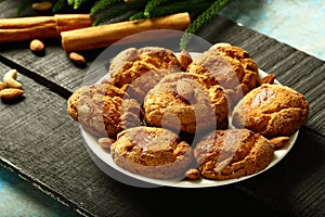 Fresh baked oatmeal cookies on a rustic background