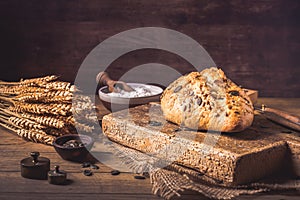 Fresh baked organic spelt flour bread with seeds