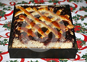 Fresh baked plum cake on christmas table