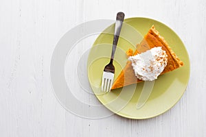 Fresh baked pumpkin pie slice